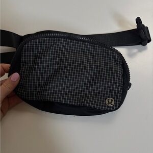 Lululemon Black Checkered Belt Bag with silver accents